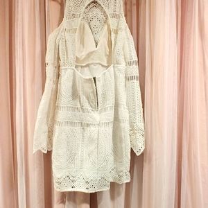 White dress with sleeves and cut out shoulders